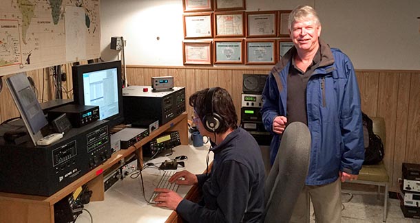 Jim Breakall and Alex Avramov at work in the ham radio shack
