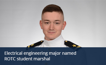 An individual in a military uniform poses for a formal portrait